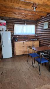 Kuchyň nebo kuchyňský kout v ubytování Cabañas el descanso