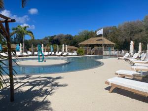 Πισίνα στο ή κοντά στο Village Kawann accès plage