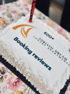 a birthday cake on top of a table at Adriatic Dream in Tivat