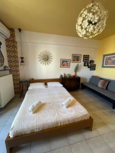 Ένα ή περισσότερα κρεβάτια σε δωμάτιο στο Reina studio