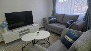 Posezení v ubytování Marvel Homes - Pumzika