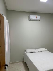 Ένα ή περισσότερα κρεβάτια σε δωμάτιο στο Casa Confort