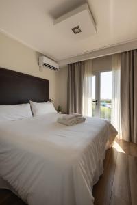 Katil atau katil-katil dalam bilik di Terrazas Ostende - Apart Hotel +45 gambar