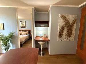 Katil atau katil-katil dalam bilik di AVILA apart hotel sector bulnes la moneda