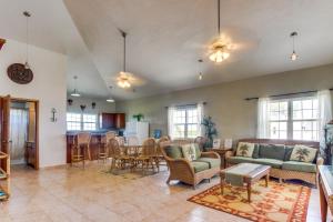a living room with a couch and a table at View the Blue -Upper Level -Gold Standard Certified in Cayo Romero