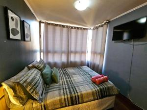 Katil atau katil-katil dalam bilik di AVILA apart hotel sector bulnes la moneda