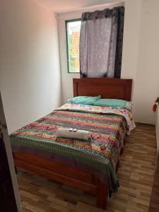 Postel nebo postele na pokoji v ubytování Hotel El Peñon Santander
