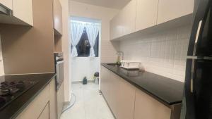 Η κουζίνα ή μικρή κουζίνα στο Tu estancia perfecta +3 φωτογραφίες