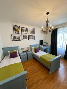 Ένα ή περισσότερα κρεβάτια σε δωμάτιο στο Aldemar Apart Hotel +11 φωτογραφίες