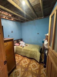 En eller flere senge i et værelse på Casa Familia Matilde