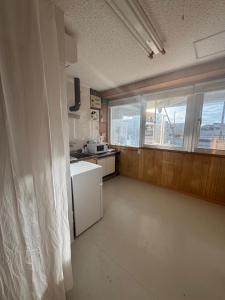 Η κουζίνα ή μικρή κουζίνα στο Minpaku ayu B