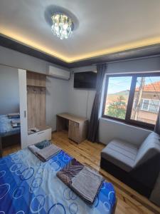 Ένα ή περισσότερα κρεβάτια σε δωμάτιο στο Guest House MARAVILA