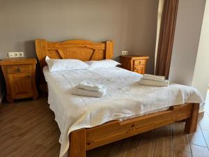 Ένα ή περισσότερα κρεβάτια σε δωμάτιο στο Hotel Sachino