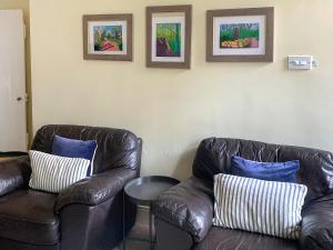 Posezení v ubytování Stable Cottage