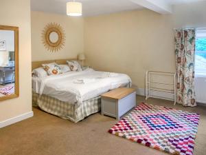 Postel nebo postele na pokoji v ubytování Stable Cottage