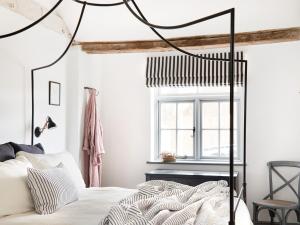 Postel nebo postele na pokoji v ubytování Eden Hall Cottage