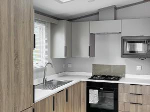 Η κουζίνα ή μικρή κουζίνα στο Katie's Cosy Caravan - Uk48380