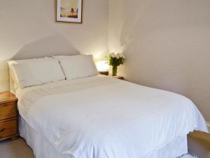 Postel nebo postele na pokoji v ubytování The Blacksmiths Shop