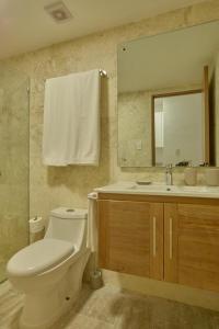 Ένα μπάνιο στο Escape Oasis in Playa Dorada Pool & Beach +9 φωτογραφίες