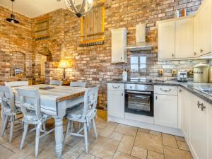 Køkken eller tekøkken på The Barn- Uk45536