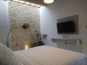 Μια τηλεόραση ή/και κέντρο ψυχαγωγίας στο Hakimi Villa