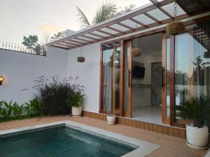 Πισίνα στο ή κοντά στο Hakimi Villa