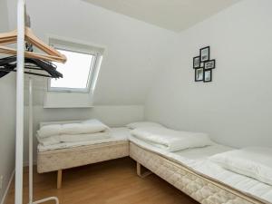 Postel nebo postele na pokoji v ubytování 20 person holiday home in Ørsted