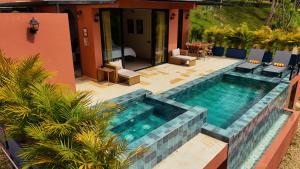 a swimming pool in the middle of a house at Indigo House, Villa Fez in San Francisco