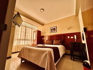 Katil atau katil-katil dalam bilik di Hotel Sol Eterno