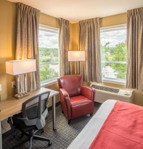 Posezení v ubytování Super 8 by Wyndham Mont Laurier + 35 fotografií