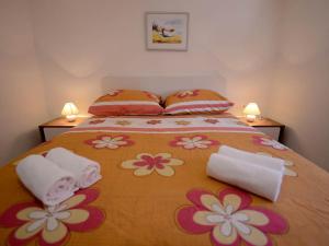 Posteľ alebo postele v izbe v ubytovaní Apartman Adriana + 37 fotografií