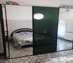 A bed or beds in a room at Casa sul rio