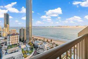 a view of the beach from the balcony of a building at The Beachside - High Floor Ocean View 2BDR with Parking Pool & Gym in Gold Coast +21 photos
