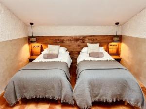 Postel nebo postele na pokoji v ubytování LA GRANGE - Maison de vacances - Entre lac et montagne + 35 fotografií