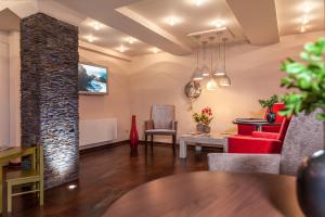 TV a/nebo společenská místnost v ubytování Altstadt-Hotel