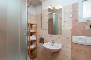 Kúpeľňa v ubytovaní Apartment Božan