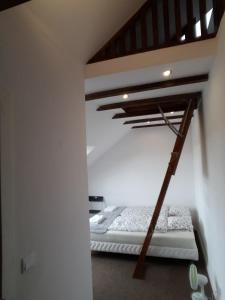 Posteľ alebo postele v izbe v ubytovaní Spa Apartamenty Lidzbark