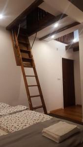 Posteľ alebo postele v izbe v ubytovaní Spa Apartamenty Lidzbark