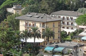 an aerial view of a hotel with palm trees at Hotel Villa Adriana in Monterosso al Mare