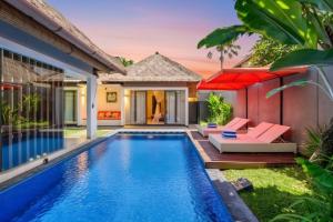 an image of a swimming pool in a villa at Villa Jerami & Spa in Seminyak