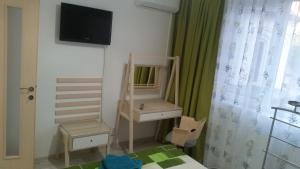 TV a/nebo společenská místnost v ubytování Calea Victoriei Residence