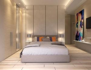 Säng eller sängar i ett rum på Twister Apartments