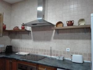 Kuchnia lub aneks kuchenny w obiekcie Casa Rural Casa Queta