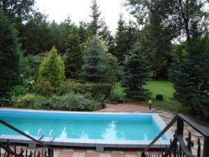Πισίνα στο ή κοντά στο Holiday Home Zgorzale by Lake Radunskie