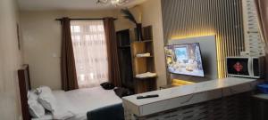 Μια τηλεόραση ή/και κέντρο ψυχαγωγίας στο KENKAM suites