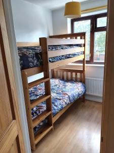 Voodi või voodid majutusasutuse Relaxing retreat close by the lakeside toas