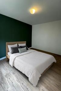 Ένα ή περισσότερα κρεβάτια σε δωμάτιο στο Casa tranquila