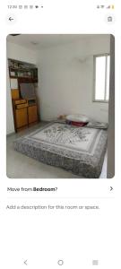 a picture of a bedroom with a bed at HarshYog Homestay in Nashik