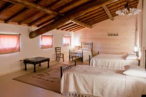 A bed or beds in a room at B&B Corte Leopoli