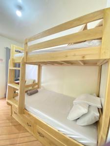 a couple of bunk beds in a room at Bool Perimeter's Inn in San Juan